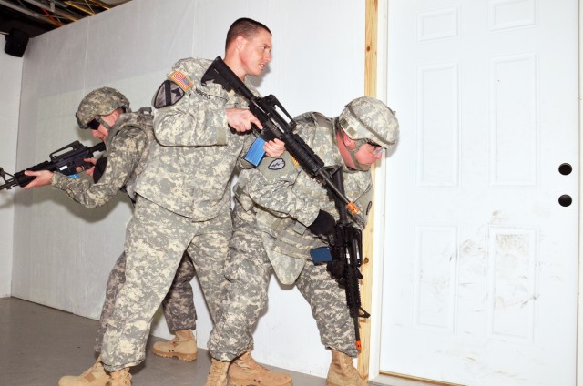 Soldiers practice clearing a room