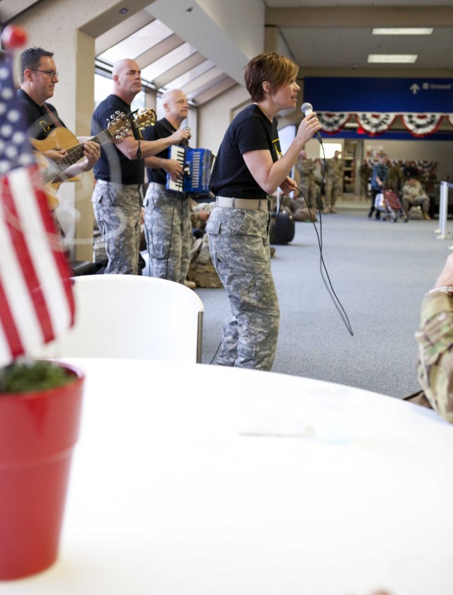 The Volunteers perform for deploying troops