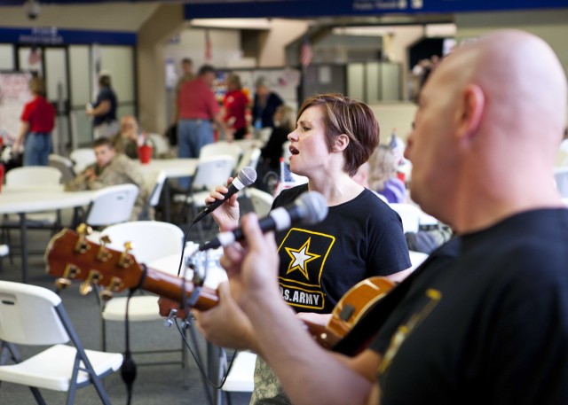 The Volunteers perform for deploying troops