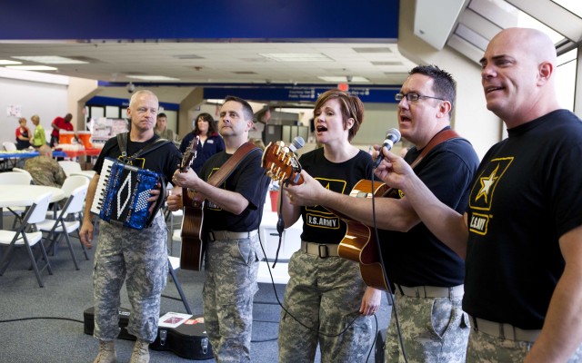 The Volunteers perform for deploying troops