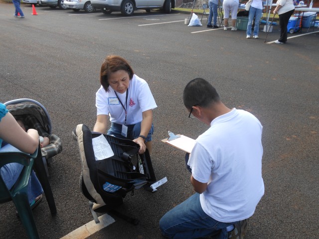 Tripler, USAG-HI, community join forces to offer car seat safety check