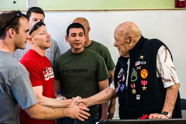Leonard shakes hands