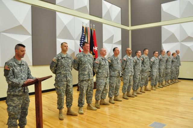 Gen. Rodriguez presents Purple Heart, re-enlists 11 Soldiers at FORSCOM band ceremony