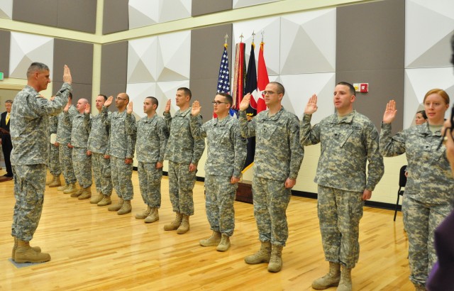 Gen. Rodriguez presents Purple Heart, re-enlists 11 Soldiers at FORSCOM band ceremony