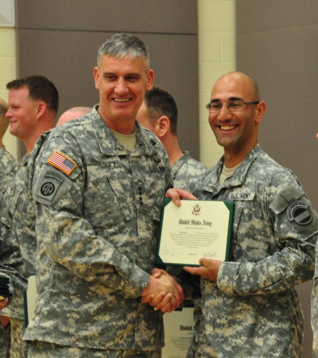 Gen. Rodriguez presents Purple Heart, re-enlists 11 Soldiers at FORSCOM band ceremony