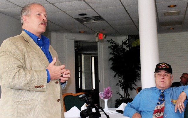 George Eaton, Army Sustainment Command historian, present 150th Anniversary program to AUSA chapter