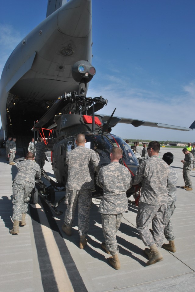 Fort Riley aviation Soldiers team with Airmen for deployment exercise