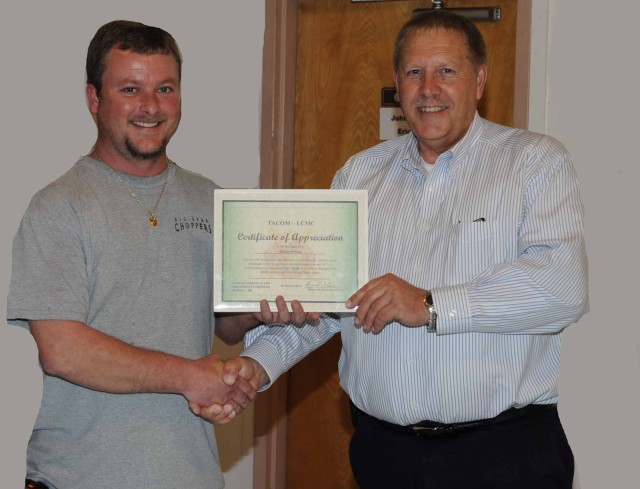 Marty Owen receives certificate of appreciation from TACOM
