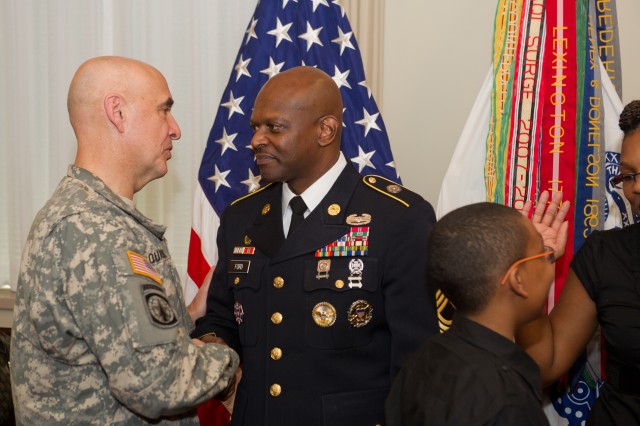 Provost Marshal General of the U.S. Army and Commanding General of USACIDC congratulates Special Agent
