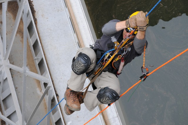 Corps' engineers climb, inspect New Hogan Dam