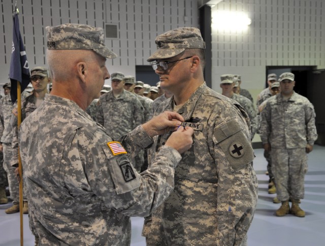 Halterman awarded Soldier's Medal by Brig. Gen. Steven P. Huber