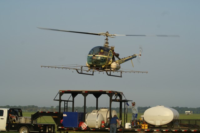U.S. Army Corps of Engineers, Tulsa District uses helicopter to prepare habitat for endangered birds