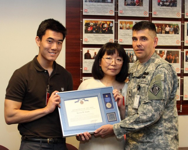 Inaugural award presented to district employee