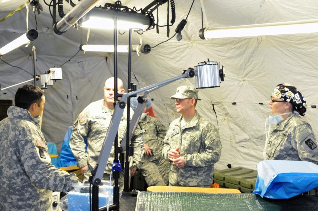 Medical team conducts live surgical field exercise