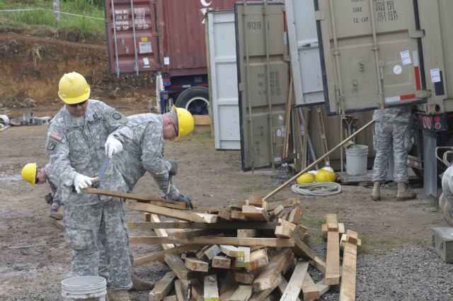 Soldiers get situated at work site in Guatemala
