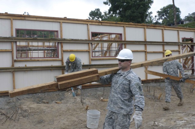 Soldiers get situated at work site in Guatemala