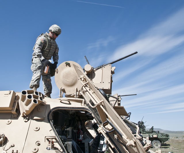 Soldiers put NBC RV Strykers, Fox vehicles through .50-caliber range