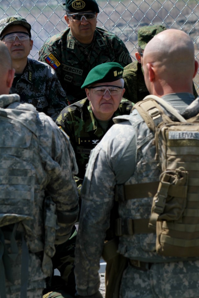 Soldiers of the 1st Squadron, 89th Cavalry Regiment, brief foreign military attach&eacute;s on the operation they'd run during a 1-89 Cavalry training exercise May 17