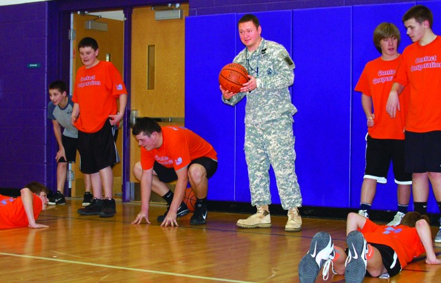 Recruiter Prepares Students for Basketball Drill.