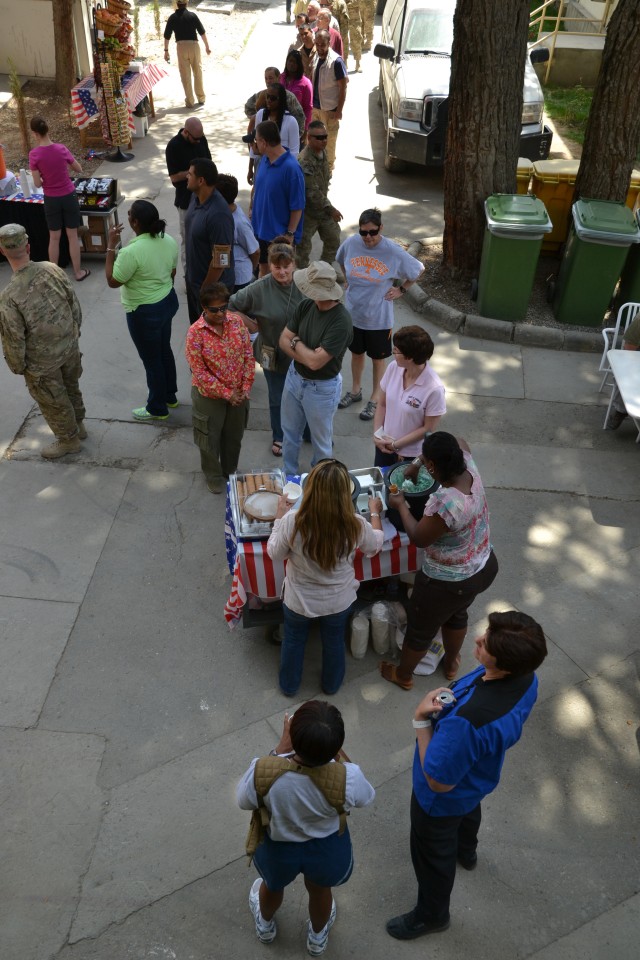 Workers Lined up to get the Scoop.