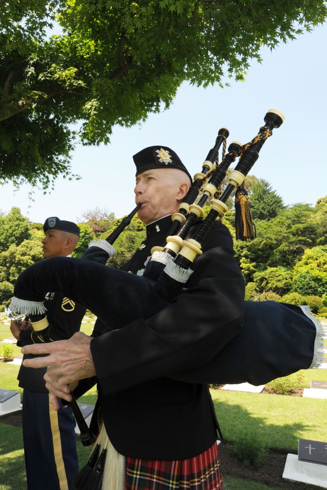 Memorial Day ceremony at Yokohama War Cemetery in Japan honors fallen service members