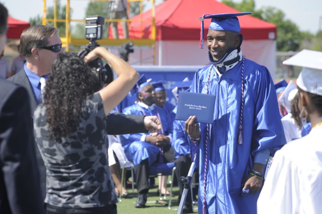 Athlete overcomes odds to graduate