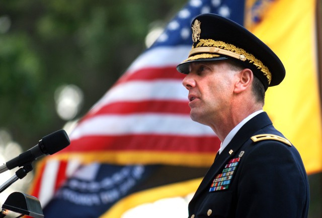 Veterans, Soldiers, Civilians Brave Tropical Storm to Celebrate Fallen Heroes