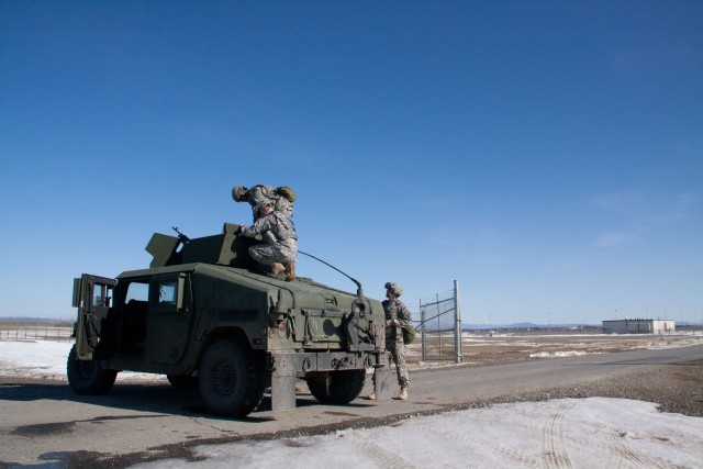 Military Police conduct vehicle preventive maintenance