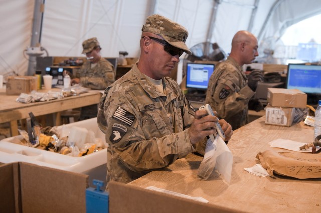 233rd Trans. Co. Soldiers help to reduce waste at Retro-Sort yard
