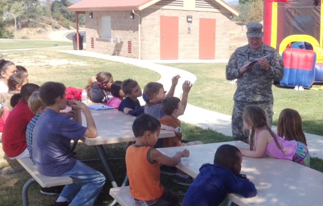 Col. James Suriano reads the 237th Army Birthday story