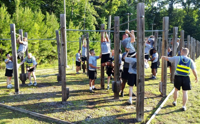 Soldiers from the 7th Sustainment Brigade conduct "Climbing Drills"