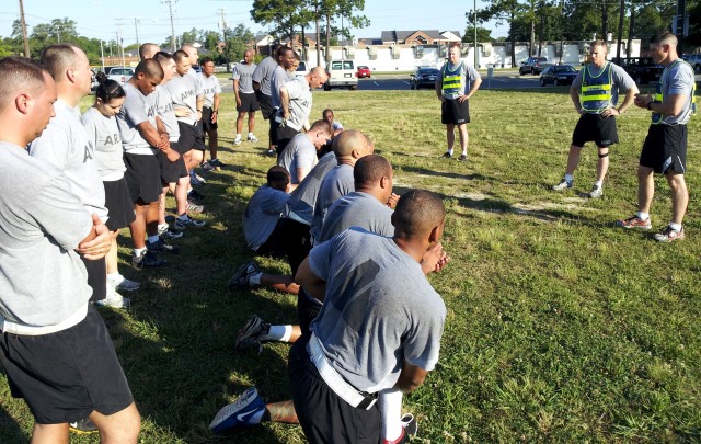 Soldiers from the 7th Sustainment Brigade listen to the Army Training Doctrine Command