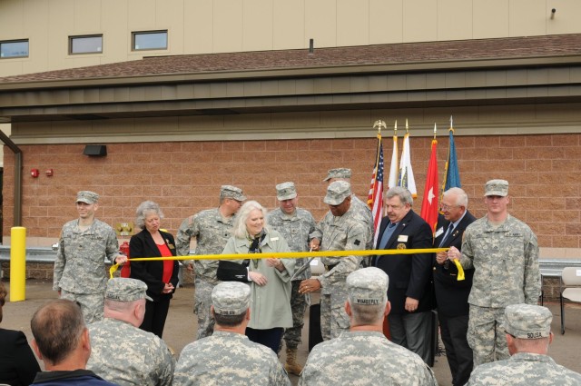 Dignitaries cut the ribbon at the dedication of Fort Custer Reserve Center