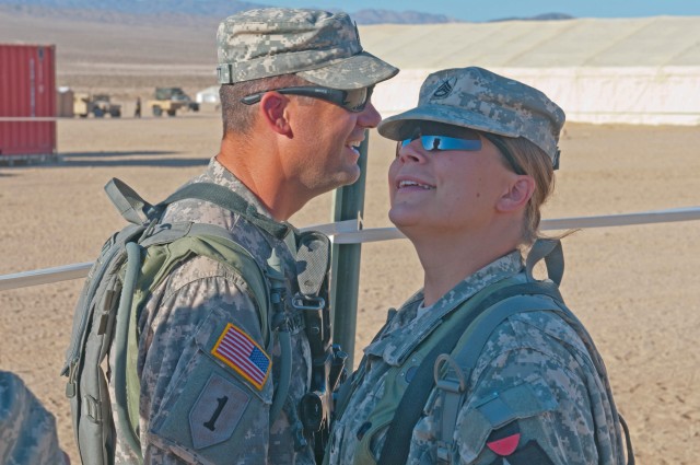 Dual military couple together for Father's Day in the desert