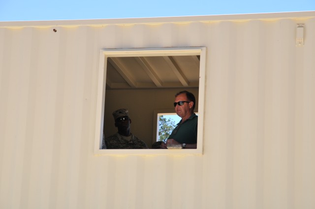 Robert Smiley looks on during cordon and search training at Fort Hunter Liggett