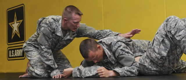 Drill Sergeant McQuiston directs a combatives moving at DSOY competition