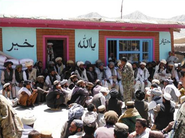 Afghan colonel works to free farmers from Taliban taxation