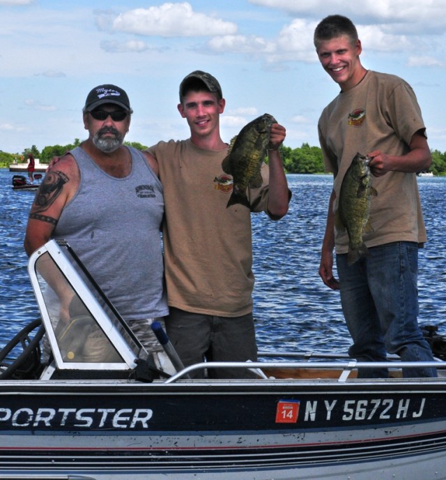 Soldiers display catch at fishing derby
