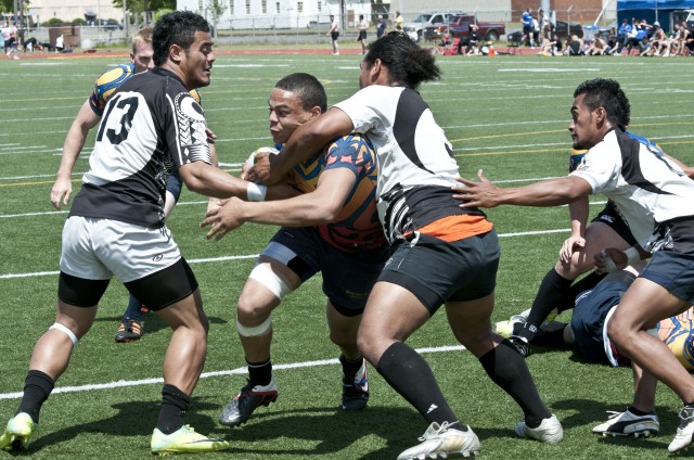 Clash of the Ruggers during JBLM's 1st Rugby Invitational Cup