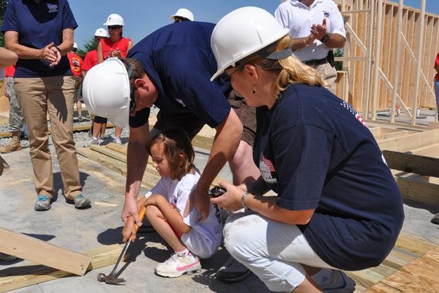 Volunteers build Wounded Warrior home