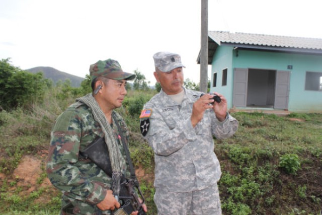 USARPAC CSM looks abinoculars used in spotting IED's