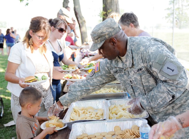 Families enjoy dinner, tour of recycling center