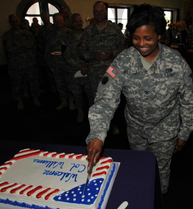 New commander cuts the cake at her reception