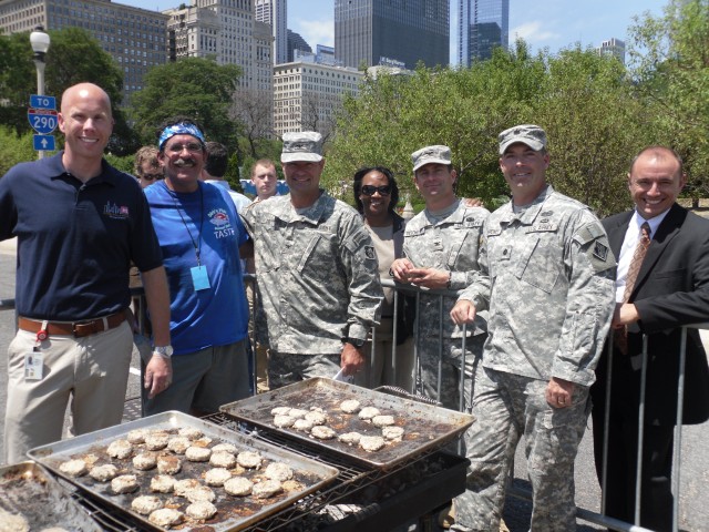 U.S. Army Corps of Engineers officials serve up Asian carp sliders and information on invasive species at the Taste of Chicago