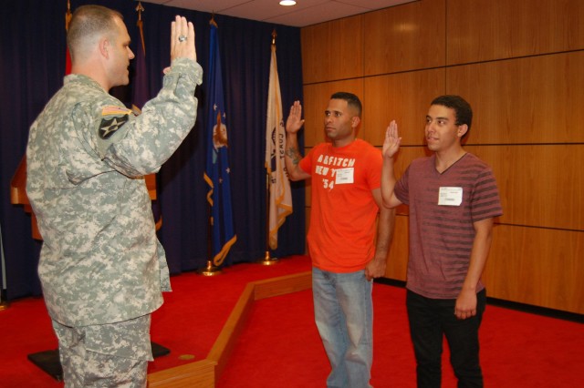 Rare, Tandem Swear-in Ceremony for Father-Son Pair