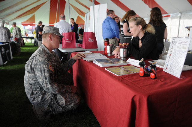 Soldier seeks information at garrison's Education Fair