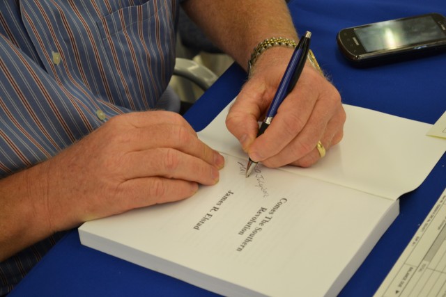 Author donates proceeds to HHC 94th Training Division's Family Readiness Group