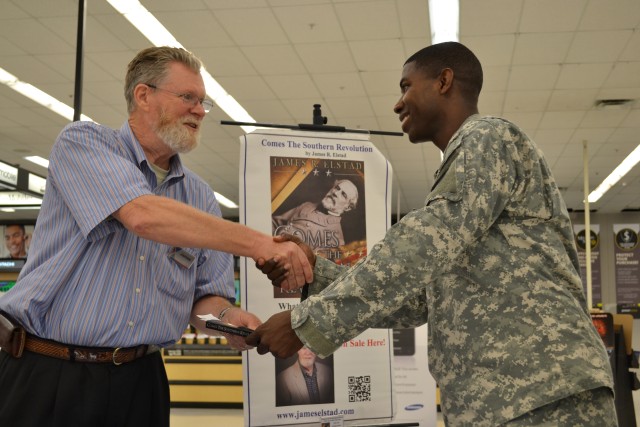 Author donates proceeds to HHC 94th Training Division's Family Readiness Group