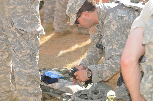 Medics help Soldiers withstand heat at Operation River Assault
