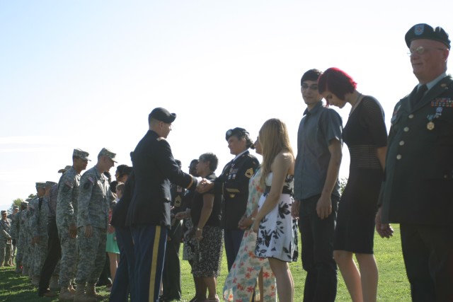 After the installation retirement ceremony on Friday, guests congratulated the retirees on Brown Parade Field. 